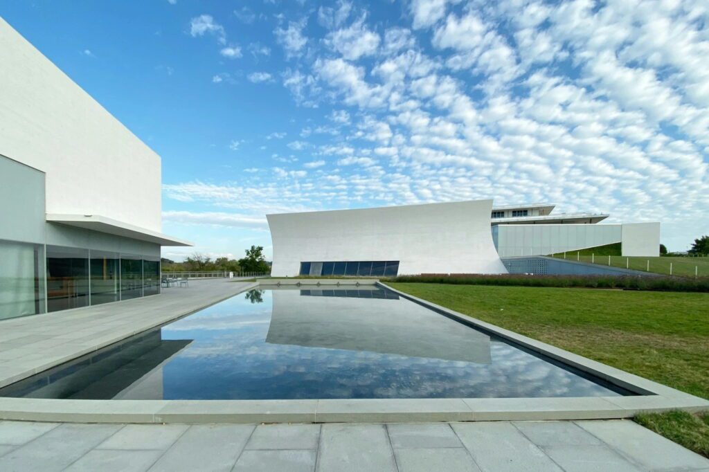 Outdoor photo of Kennedy Center with reflecting pool