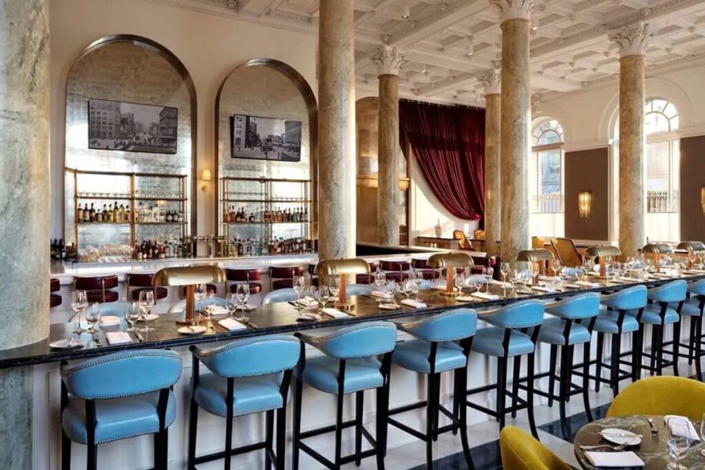 Hotel bar with blue barstools